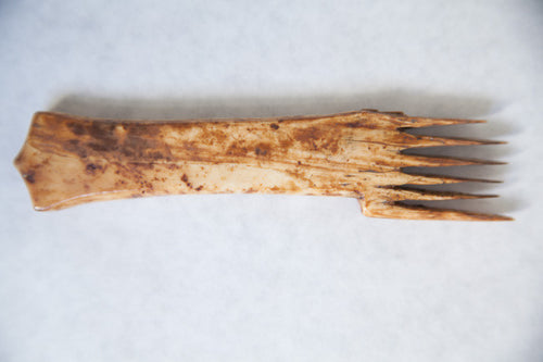 prehistoric Inuit ivory comb with 6 fingers