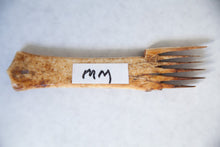 prehistoric Inuit ivory comb with 6 fingers