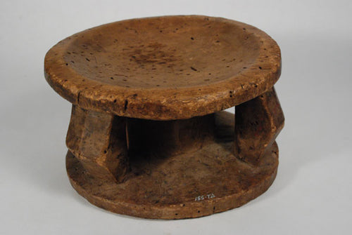 An old Lega stool with glossy patina from the Congo