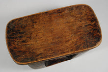 the top of a East African stool