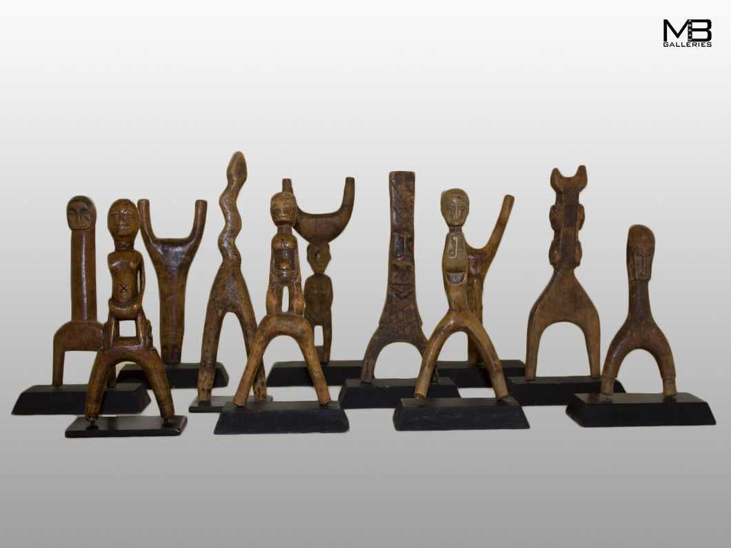 An Exceptional Collection Of Baule Figural Slingshots